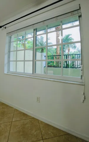 a bathroom with a granite countertop sink a mirror and a vanity