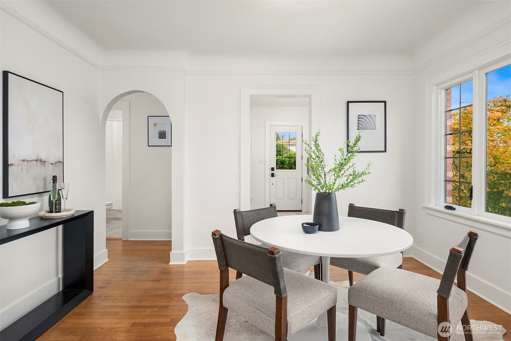 2503 37th Avenue West Seattle, WA 98199 - Photo 11 of 36 a dining room with furniture and window