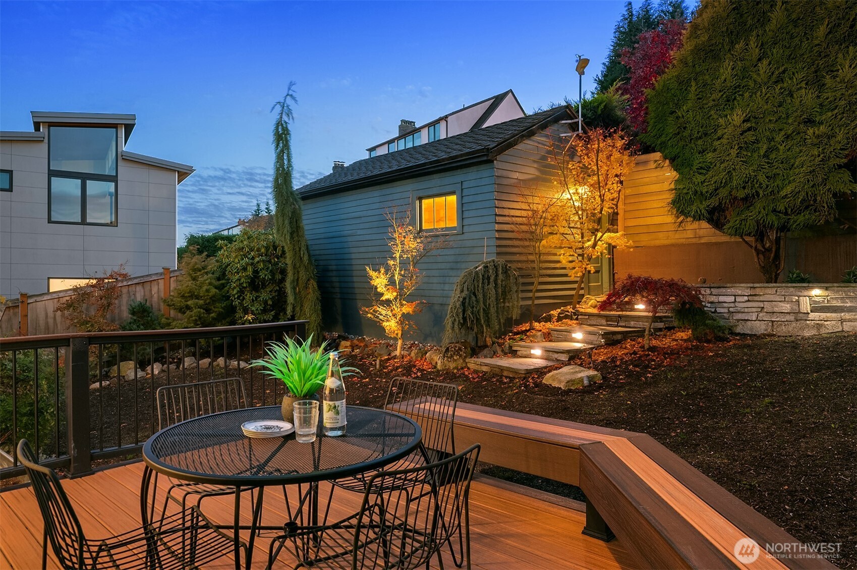 2503 37th Avenue West Seattle, WA 98199 - Photo 32 of 36 a view of house with backyard and sitting area