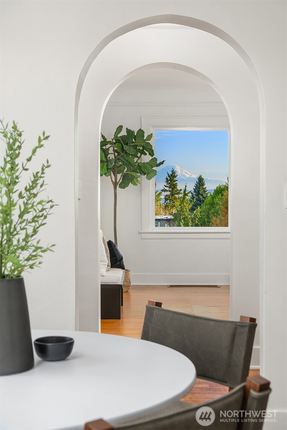 2503 37th Avenue West Seattle, WA 98199 - Photo 9 of 36 a picture of a table with chairs