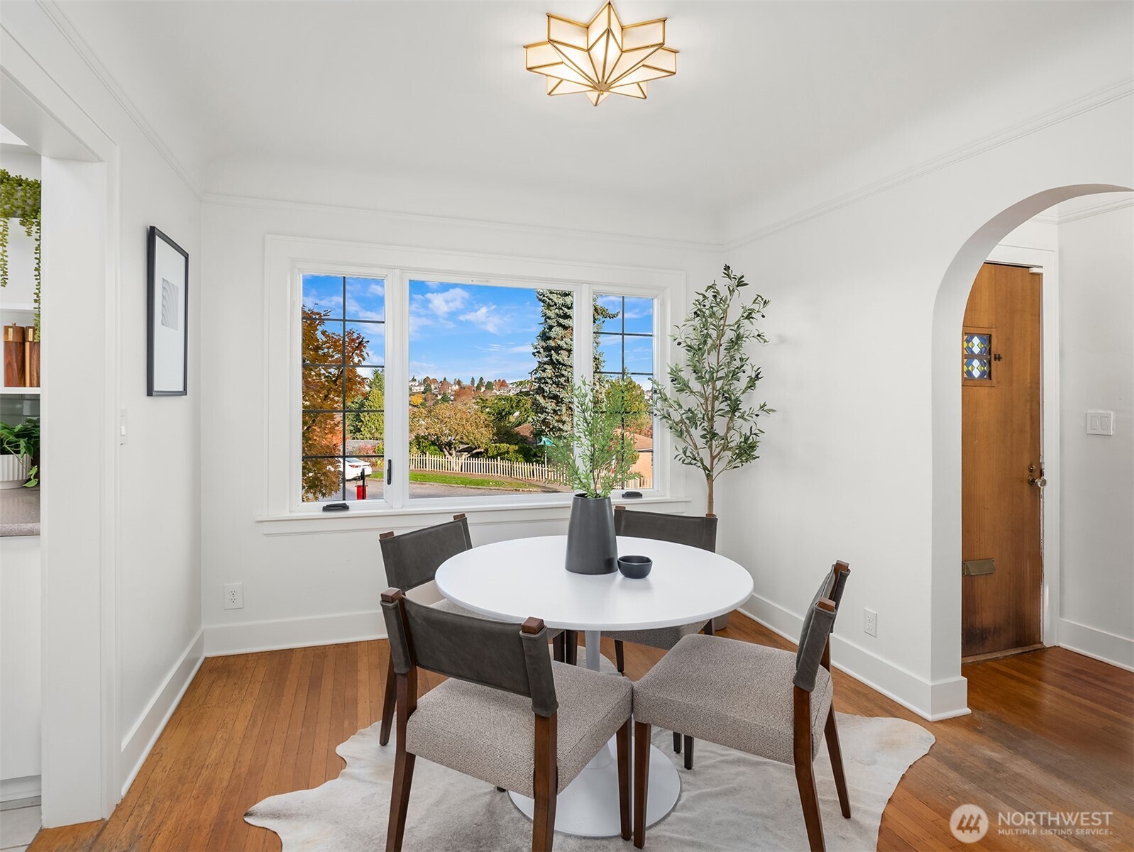 2503 37th Avenue West Seattle, WA 98199 - Photo 10 of 36 a dining room with furniture and window
