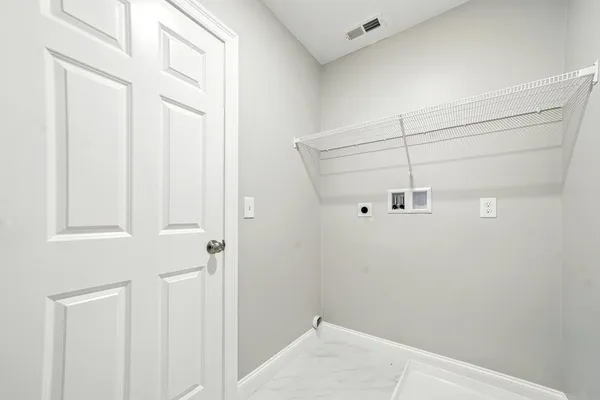 a view of a hallway with closet