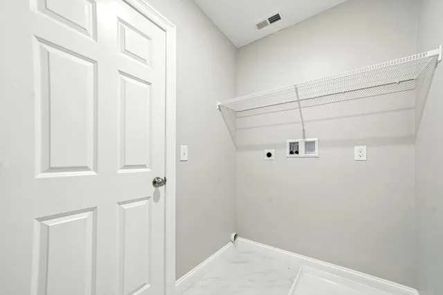 a view of a hallway with closet