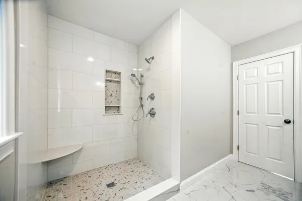 a bathroom with a sink and a shower