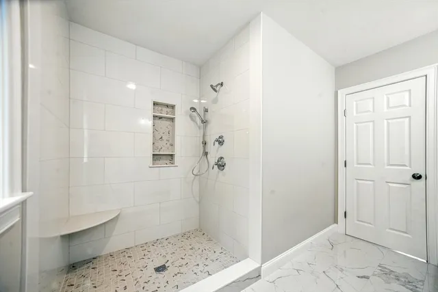a bathroom with a sink and a shower