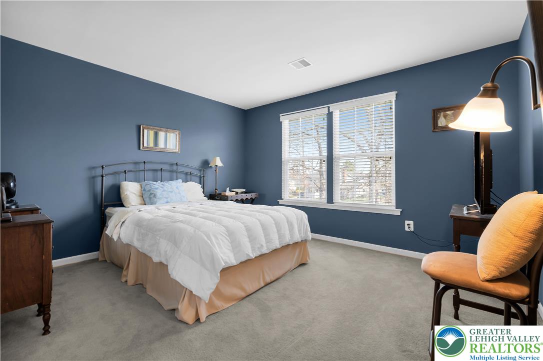 222 Lower Way Road Easton, PA 18045 - Photo 30 of 45 a bedroom with a bed chair and a window