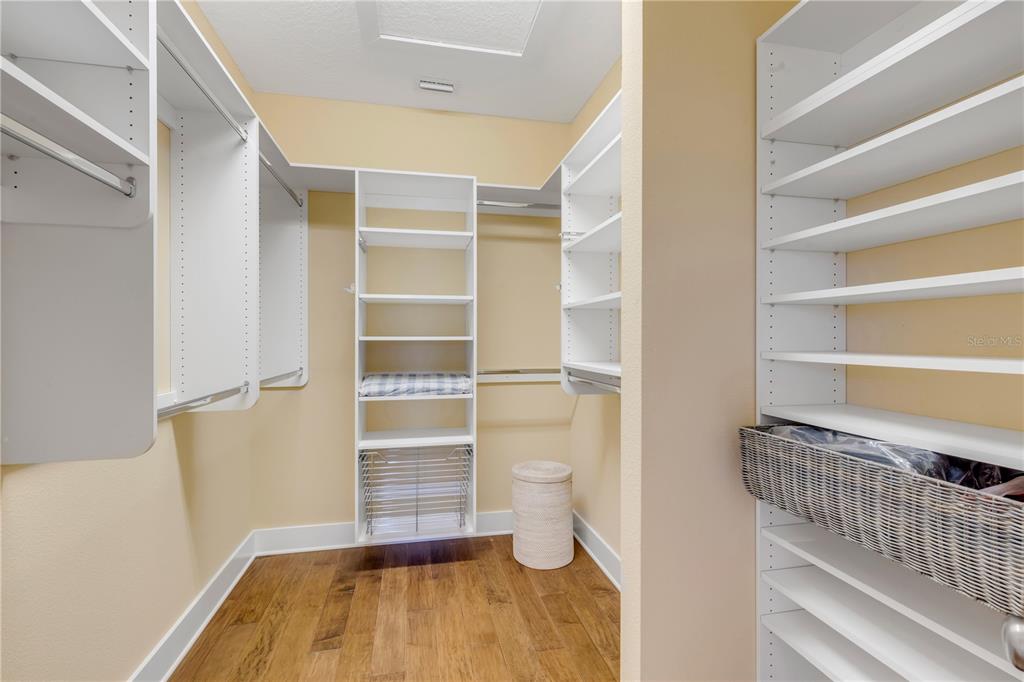 6101 Turtlemound Road New Smyrna Beach, FL 32169 - Photo 32 of 82 a room with a closet and wooden floor