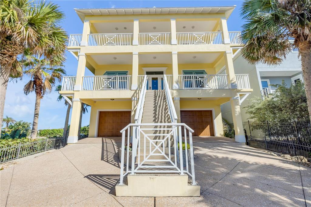 6101 Turtlemound Road New Smyrna Beach, FL 32169 - Photo 4 of 82 a front view of a building