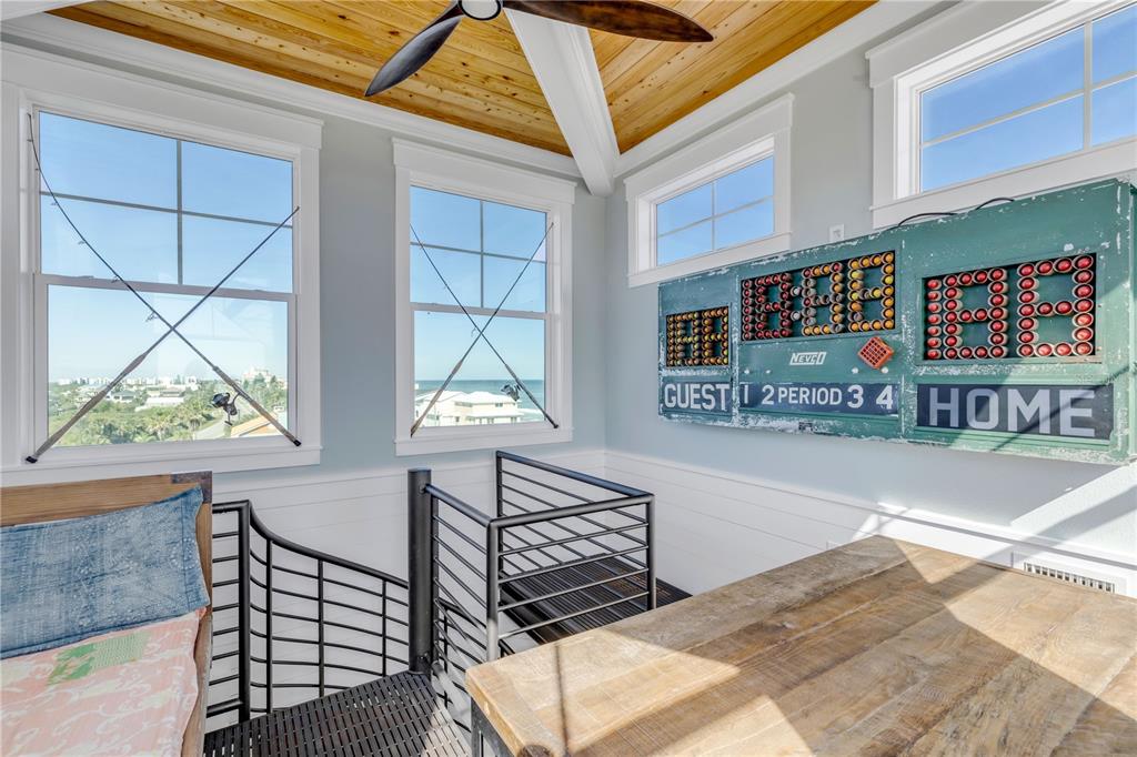 6101 Turtlemound Road New Smyrna Beach, FL 32169 - Photo 51 of 82 a view of a chairs and table in a patio