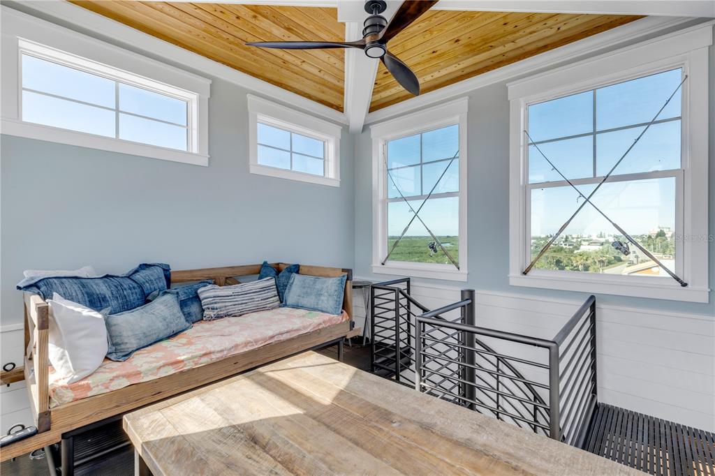 6101 Turtlemound Road New Smyrna Beach, FL 32169 - Photo 53 of 82 a living room with furniture and a window