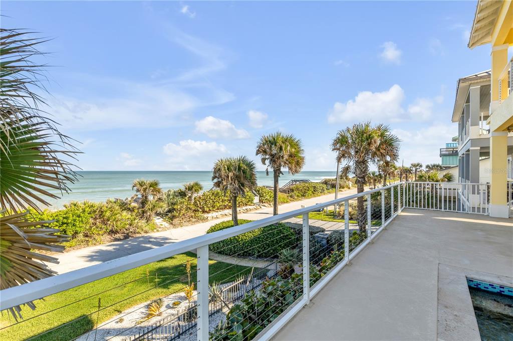 6101 Turtlemound Road New Smyrna Beach, FL 32169 - Photo 71 of 82 a view of a balcony with wooden floor