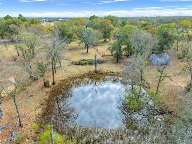 a view of a yard with an outdoor space