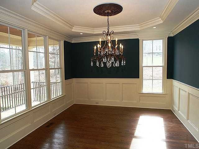 7315 Ridgeline Drive Raleigh, NC 27613 - Photo 2 of 8 a view of an empty room with wooden floor and a window