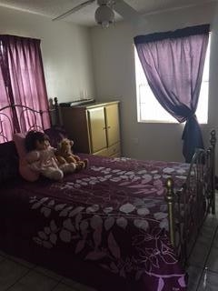 227 Northpoint Drive Laredo, TX 78041 - Photo 5 of 9 a bed sitting in a room next to a window