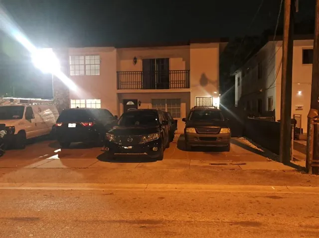 a car parked in front of a building