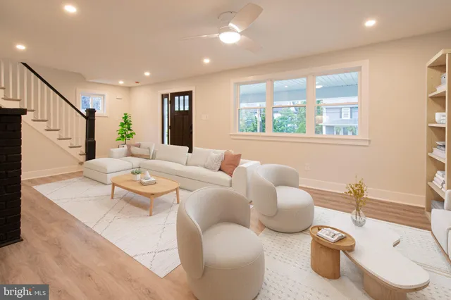 a living room with furniture and a table