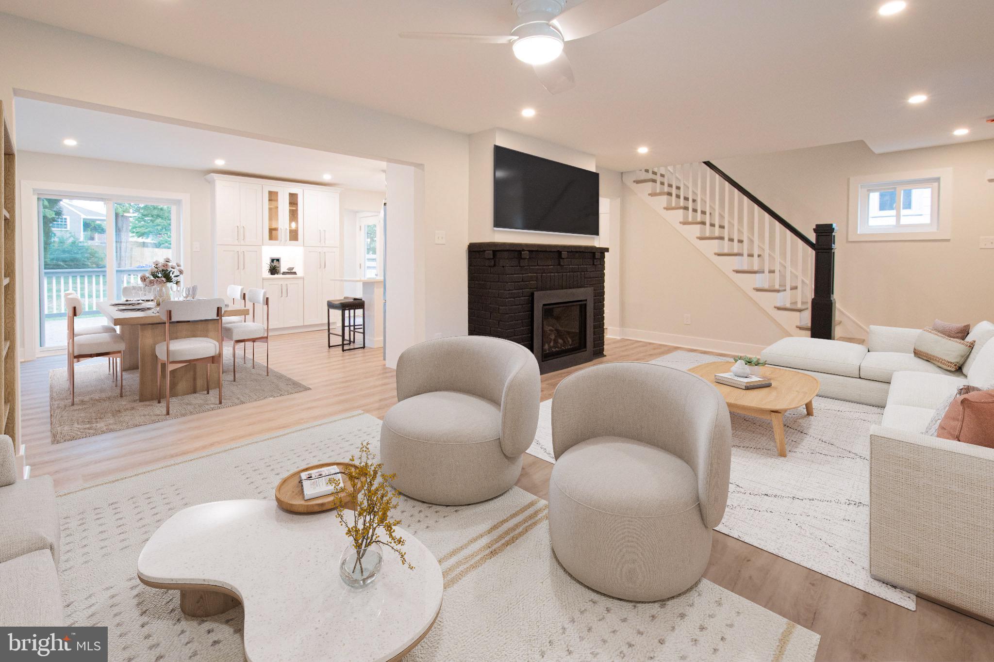 21 Manor Road Paoli, PA 19301 - Photo 6 of 35 a living room with furniture and a fireplace