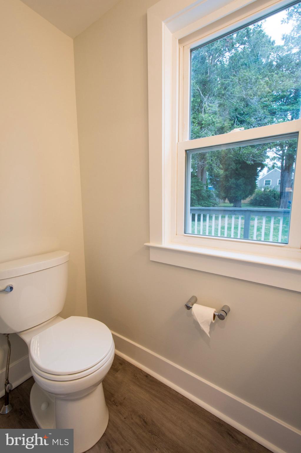 21 Manor Road Paoli, PA 19301 - Photo 8 of 35 a bathroom with a toilet and a sink