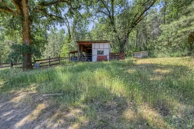 a view of a town with mountains in the background