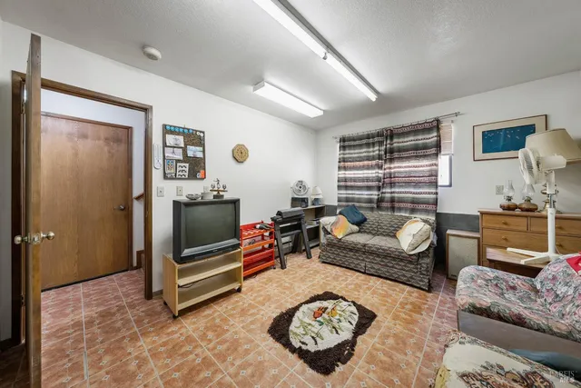 a view of a outdoor space with a house in the background