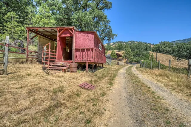 a view of a backyard of a house
