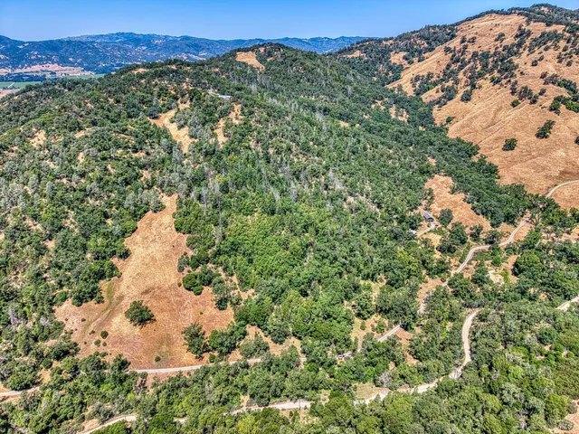 a view of a city with a mountain