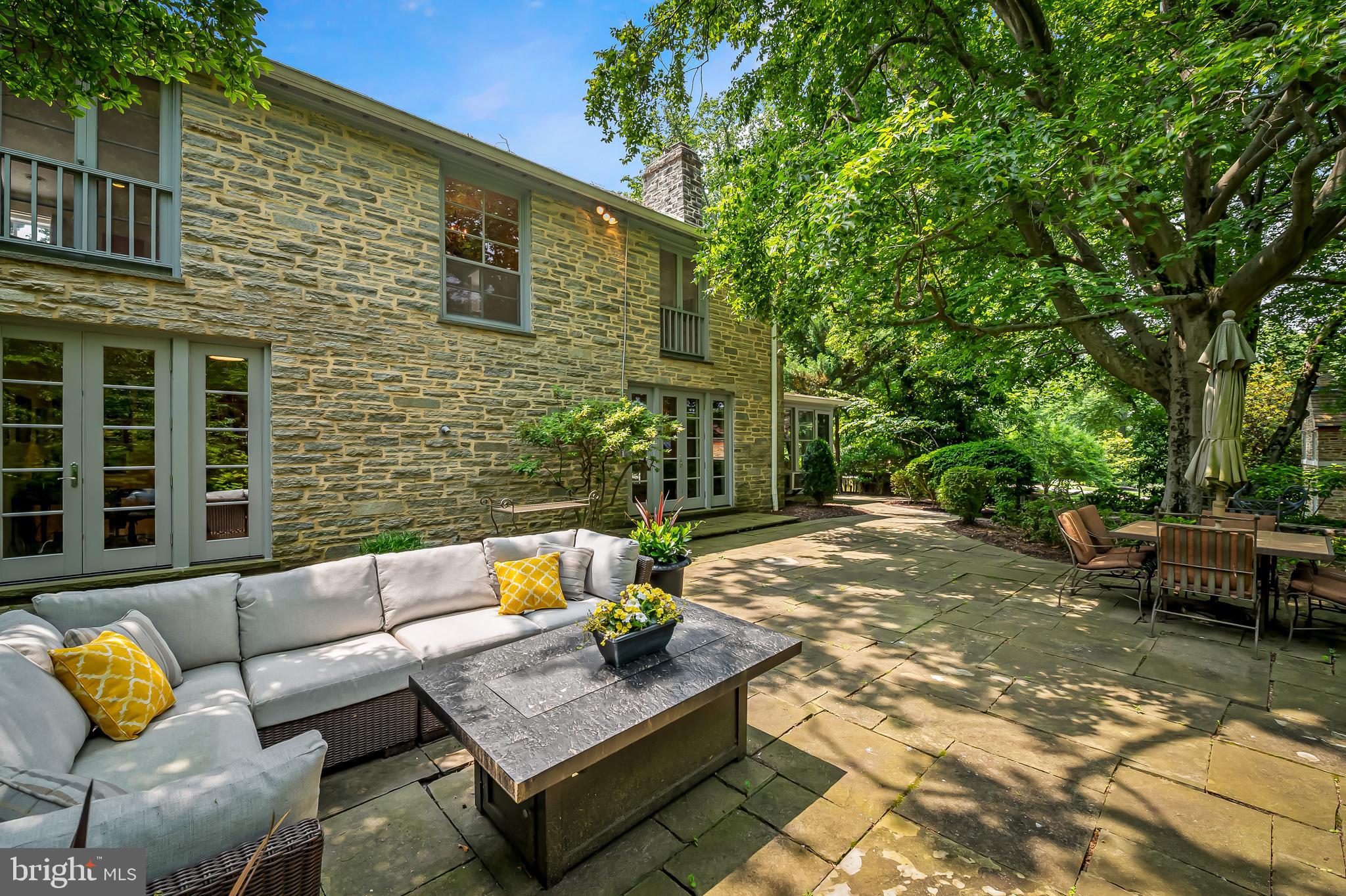 6 Meadow Road Baltimore, MD 21212 - Photo 25 of 66 a view of a patio with couches and a table and chairs with garden view