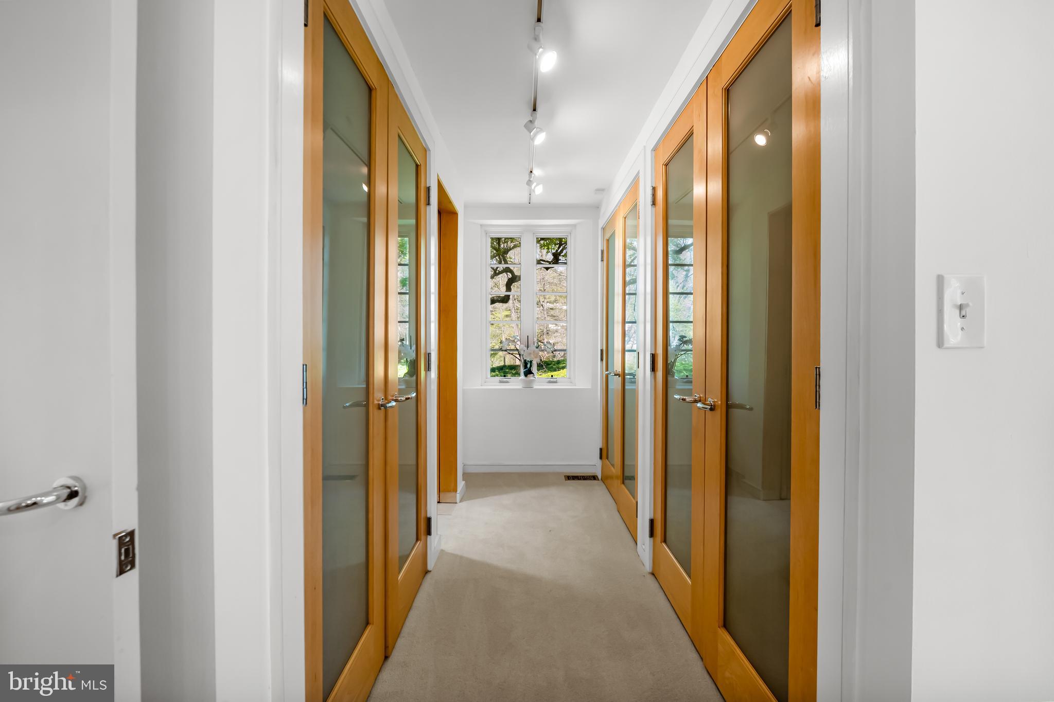 6 Meadow Road Baltimore, MD 21212 - Photo 33 of 66 a view of a hallway with wooden shelves