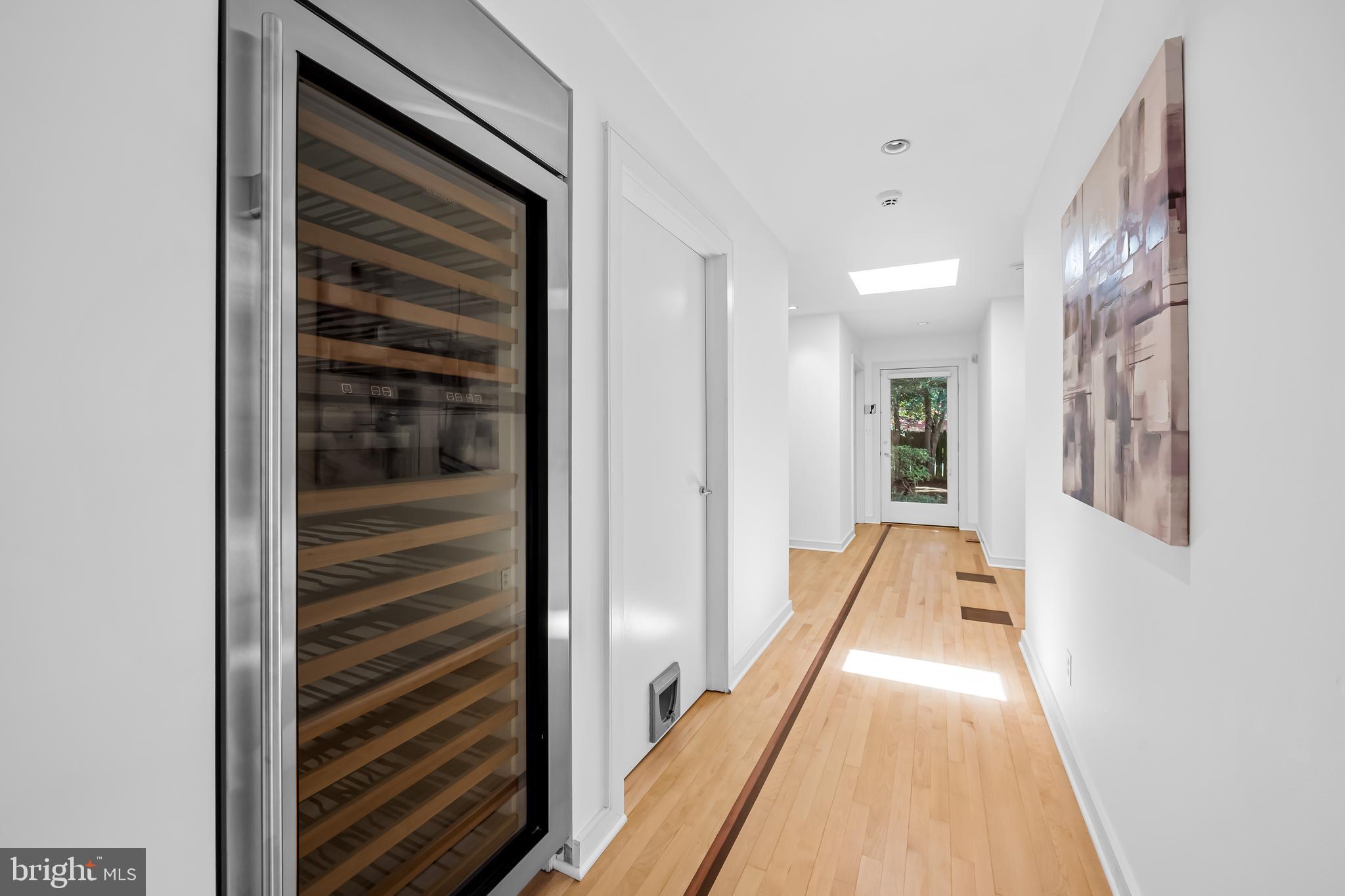 6 Meadow Road Baltimore, MD 21212 - Photo 39 of 66 a view of a hallway with wooden floor and staircase