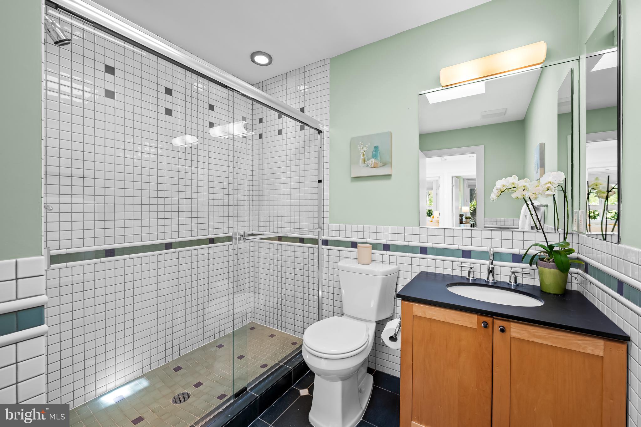 6 Meadow Road Baltimore, MD 21212 - Photo 42 of 66 a bathroom with a sink toilet and shower