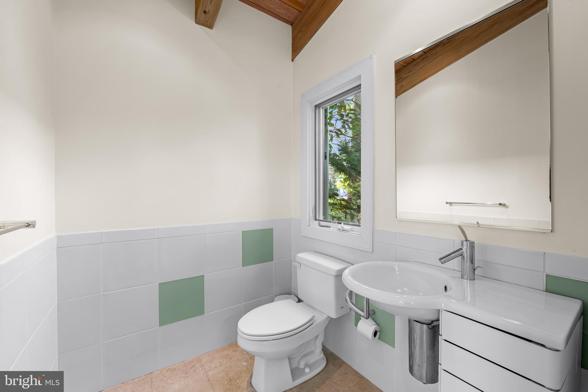 6 Meadow Road Baltimore, MD 21212 - Photo 58 of 66 a bathroom with a sink toilet and a mirror