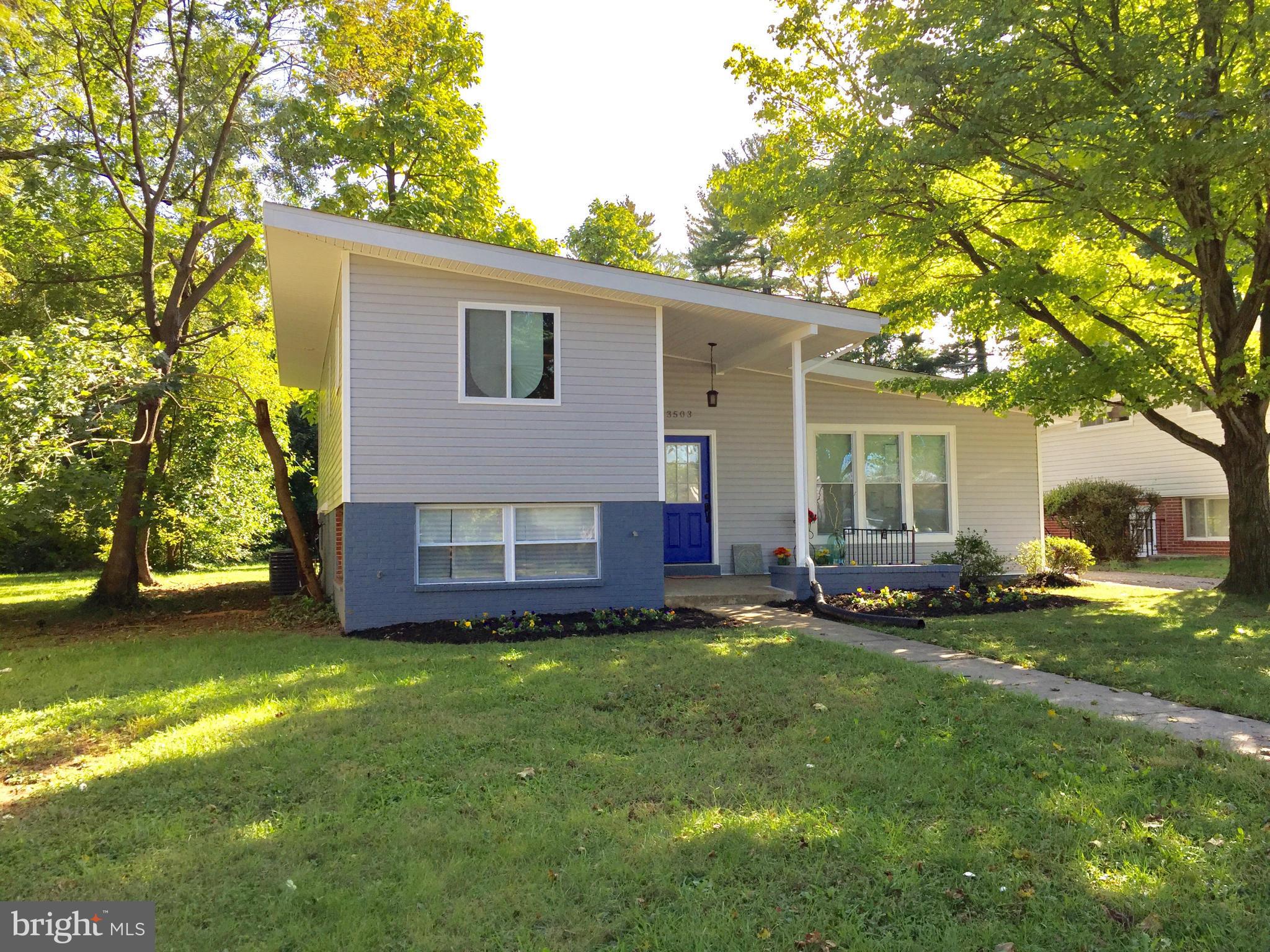 3503 Milford Mill Road Baltimore, MD 21244 - Photo 1 of 27 a view of a house with a yard and tree s