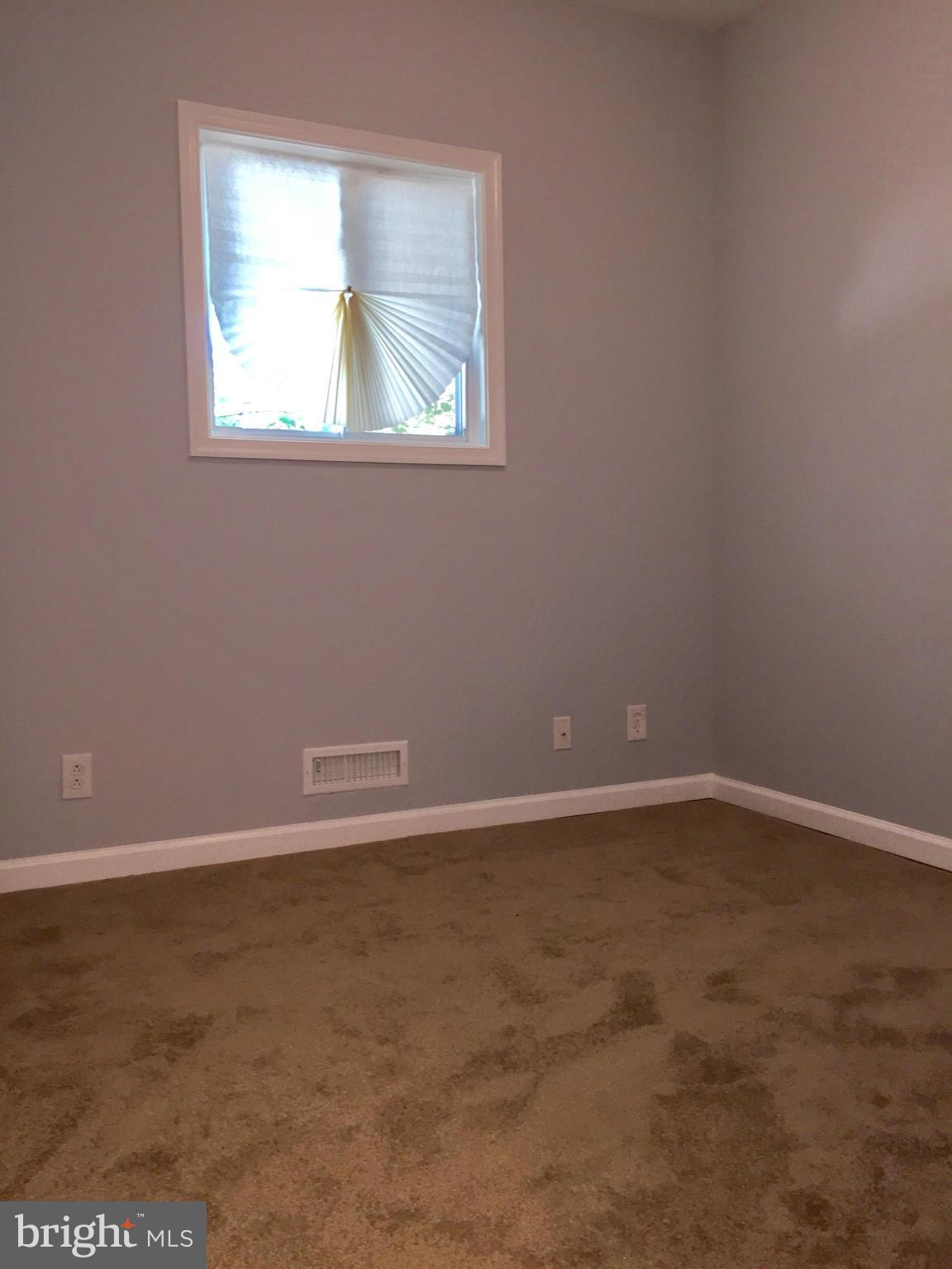 3503 Milford Mill Road Baltimore, MD 21244 - Photo 17 of 27 an empty room with a window