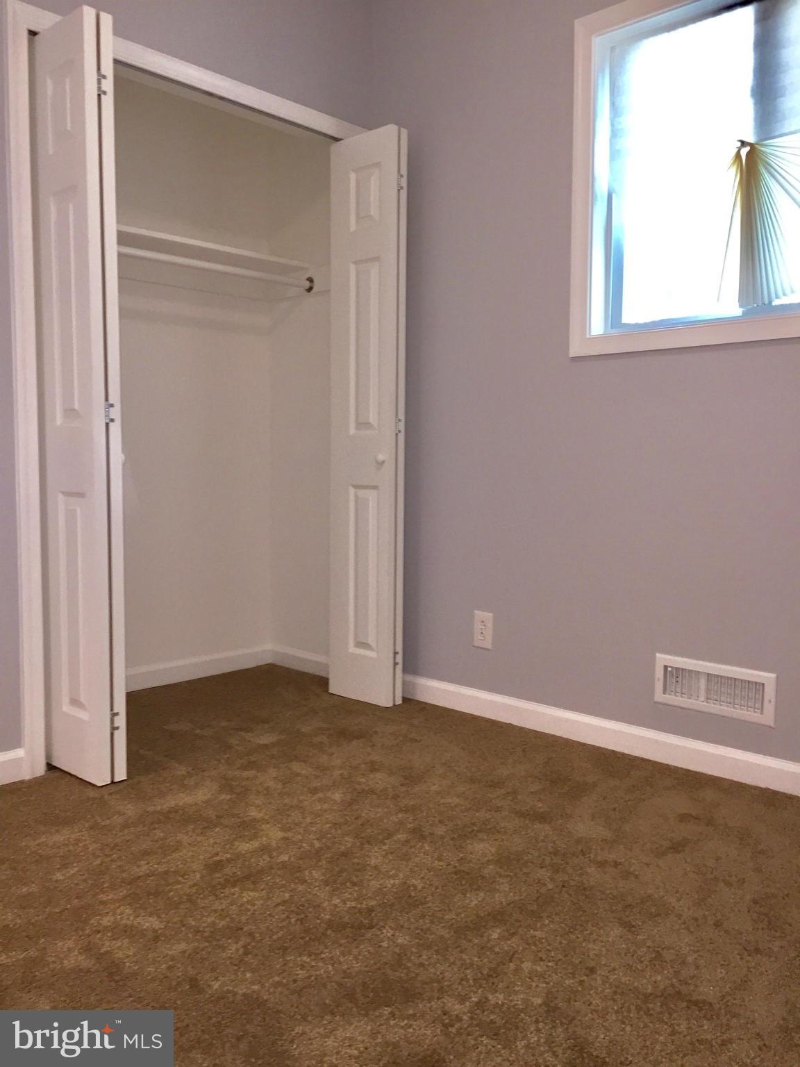 3503 Milford Mill Road Baltimore, MD 21244 - Photo 18 of 27 a view of an empty room with a window