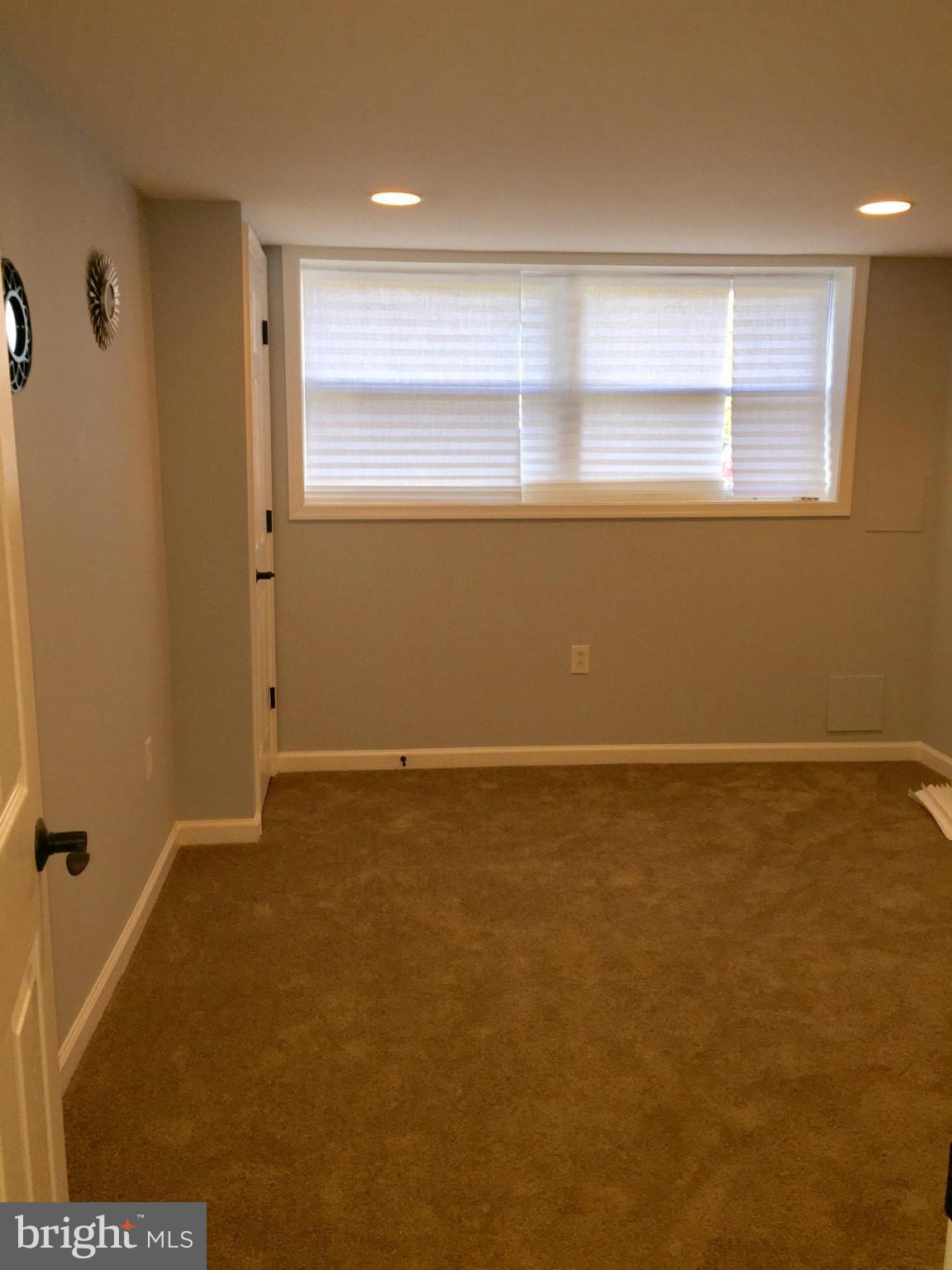 3503 Milford Mill Road Baltimore, MD 21244 - Photo 27 of 27 a view of an empty room with a window