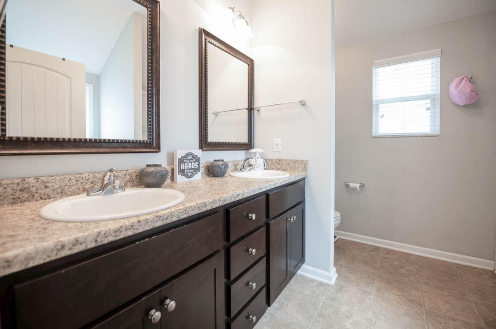 738 Neville Street Grovetown, GA 30813 - Photo 16 of 25 Owner's bath with a double sink vanity with framed mirrors, garden tub and separate shower!