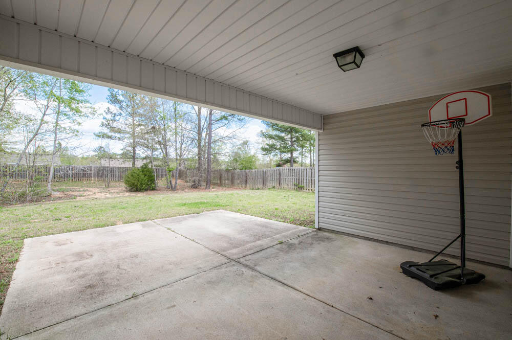 738 Neville Street Grovetown, GA 30813 - Photo 23 of 25 Large privacy fenced backyard with covered porch and patio perfect for grilling or entertaining!
