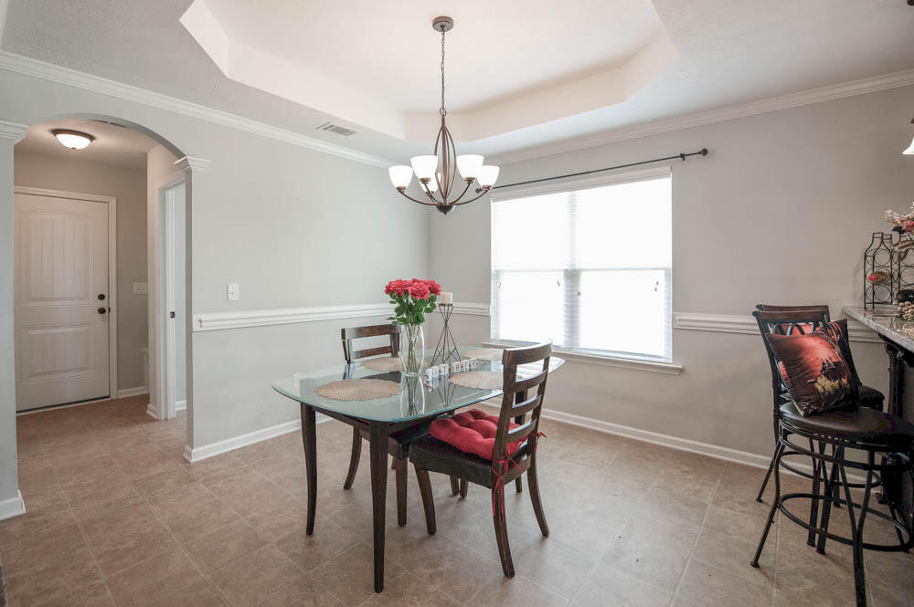 738 Neville Street Grovetown, GA 30813 - Photo 9 of 25 Living room with vaulted ceilings and fan!