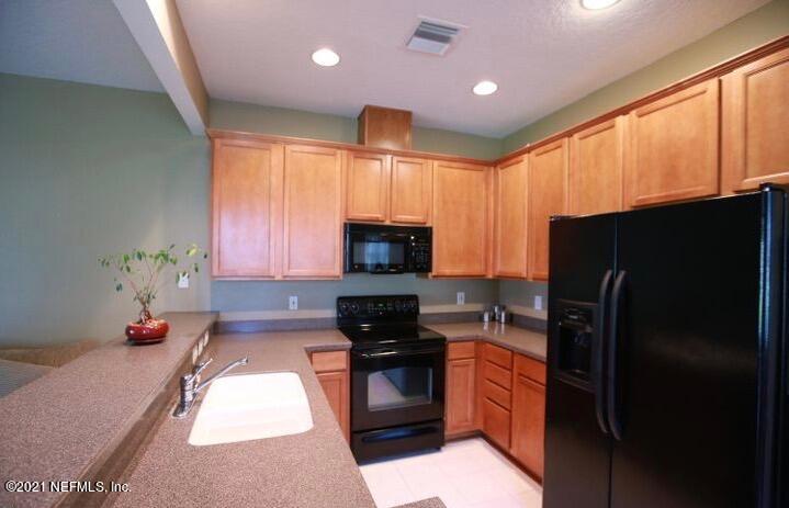 12998 Spring Rain Road Jacksonville, FL 32258 - Photo 8 of 32 KITCHEN