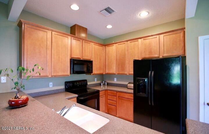 12998 Spring Rain Road Jacksonville, FL 32258 - Photo 9 of 32 KITCHEN