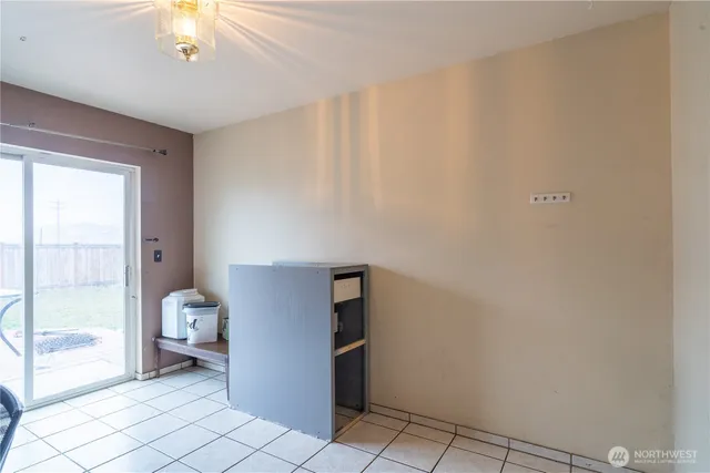 a workspace with furniture and a window