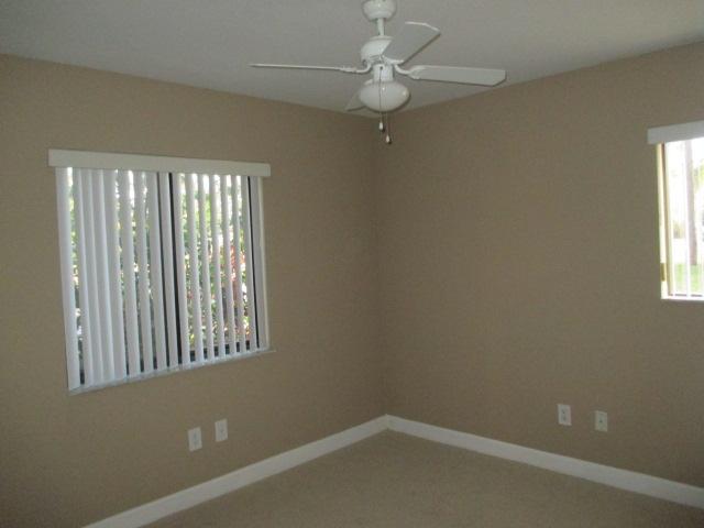 6701 Mallards Cove Road, Unit 13A Jupiter, FL 33458 - Photo 6 of 10 Guest Bedroom