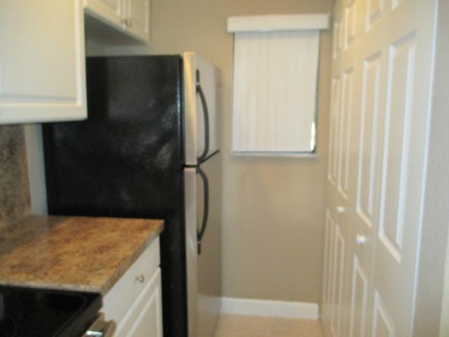 6701 Mallards Cove Road, Unit 13A Jupiter, FL 33458 - Photo 8 of 10 Laundry Closet