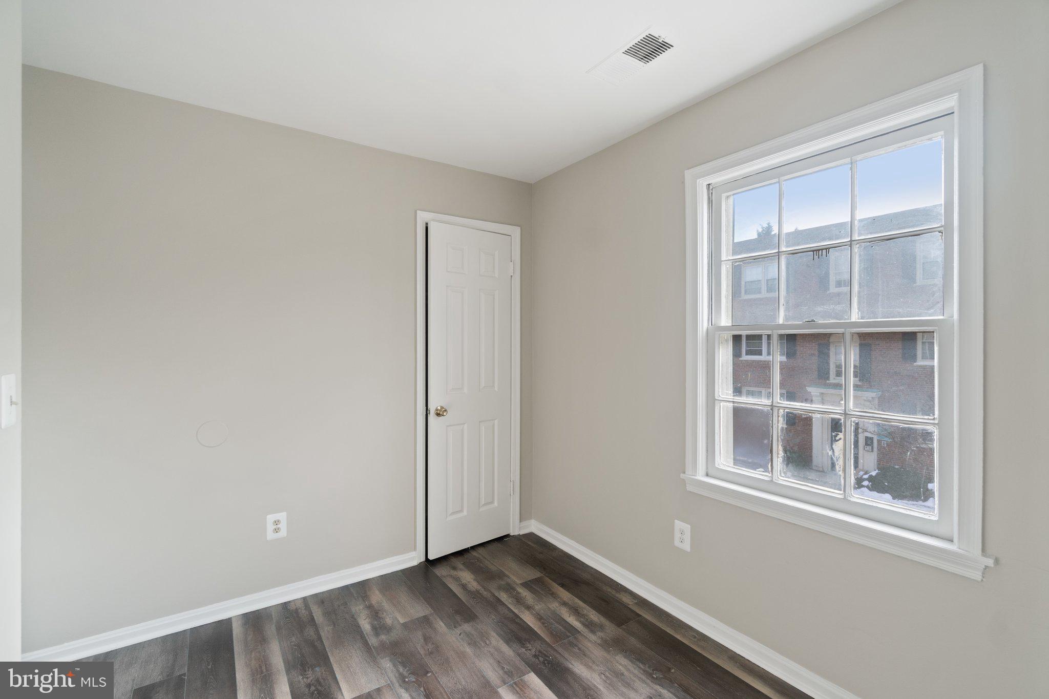 2016 37th Street Southeast, Unit 201 Washington, DC 20020 - Photo 11 of 17 a view of an empty room with a window