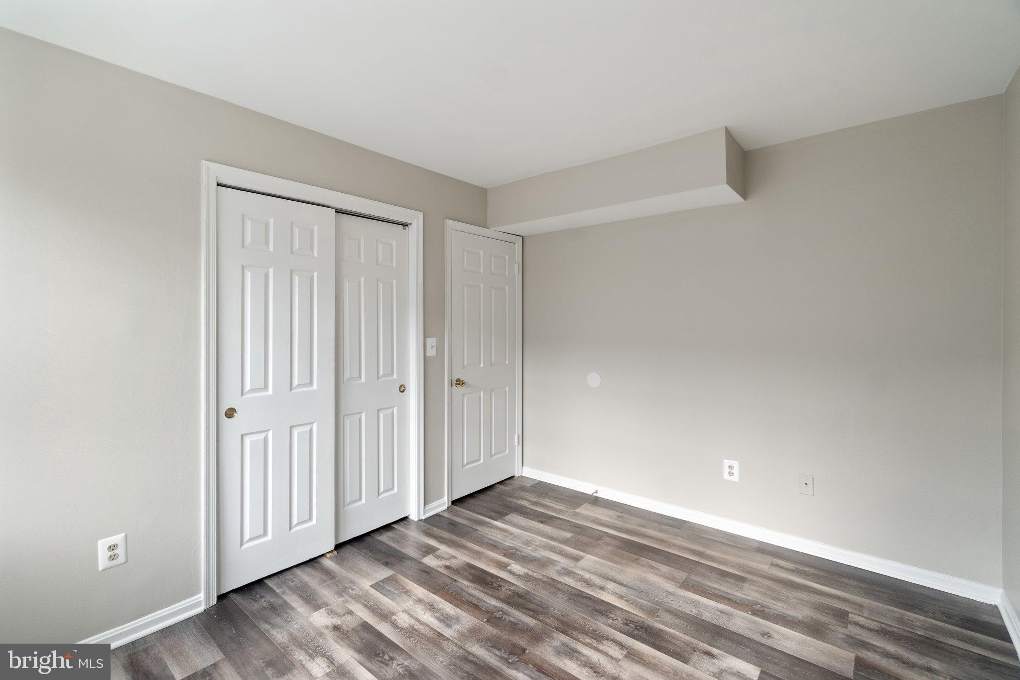 2016 37th Street Southeast, Unit 201 Washington, DC 20020 - Photo 15 of 17 a view of a livingroom with wooden floor and entryway