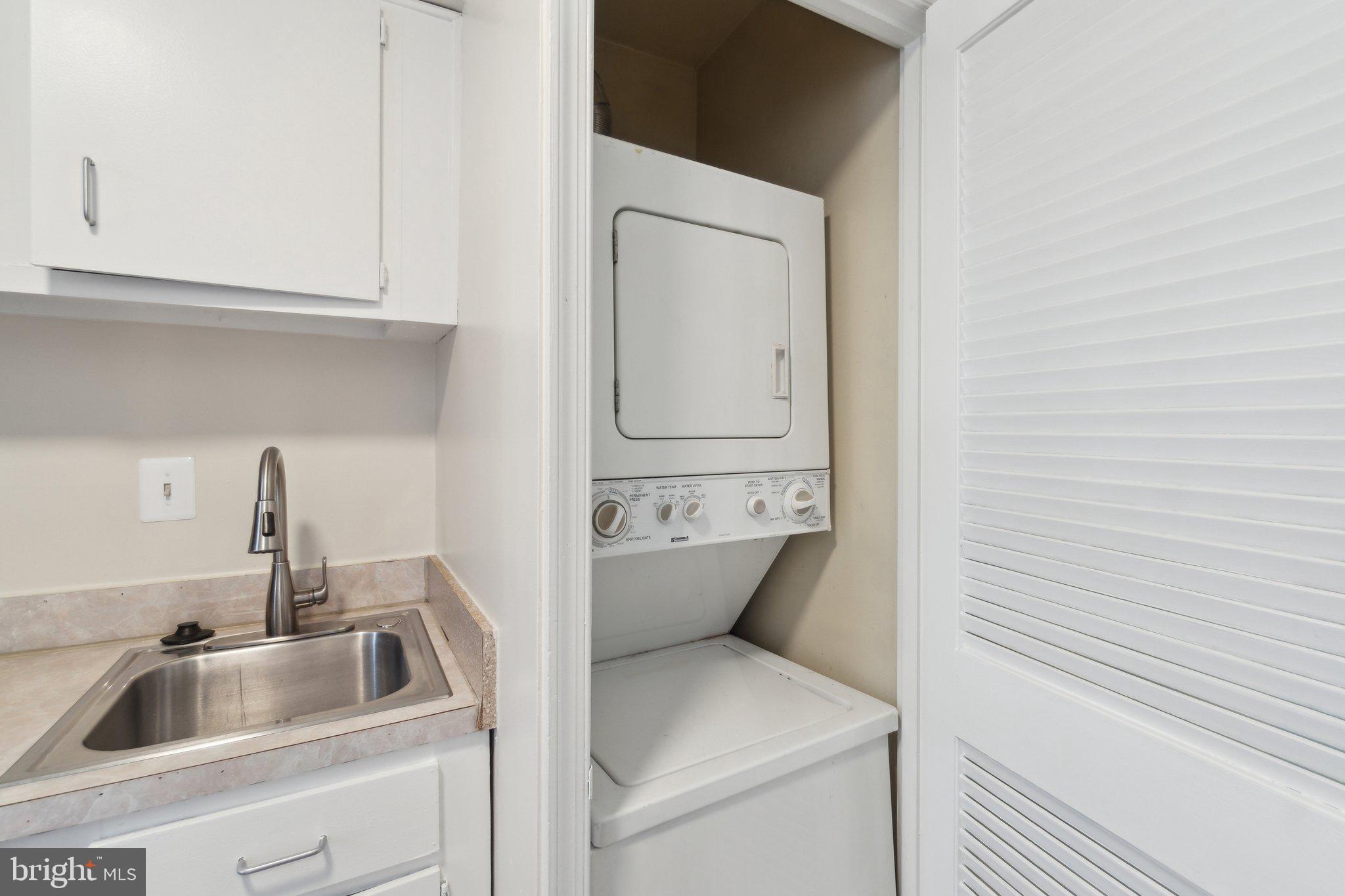 2016 37th Street Southeast, Unit 201 Washington, DC 20020 - Photo 6 of 17 a bathroom with a sink and toilet