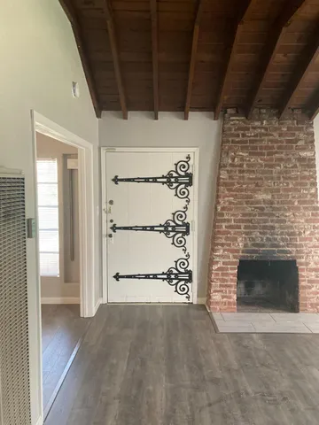 a view of empty room with front door