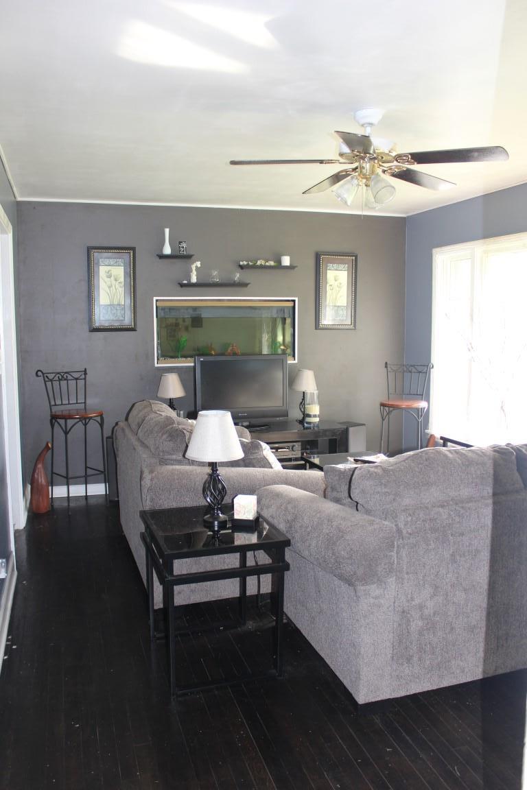 221 Randy Road Madison, TN 37115 - Photo 6 of 23 a living room with furniture and a chandelier