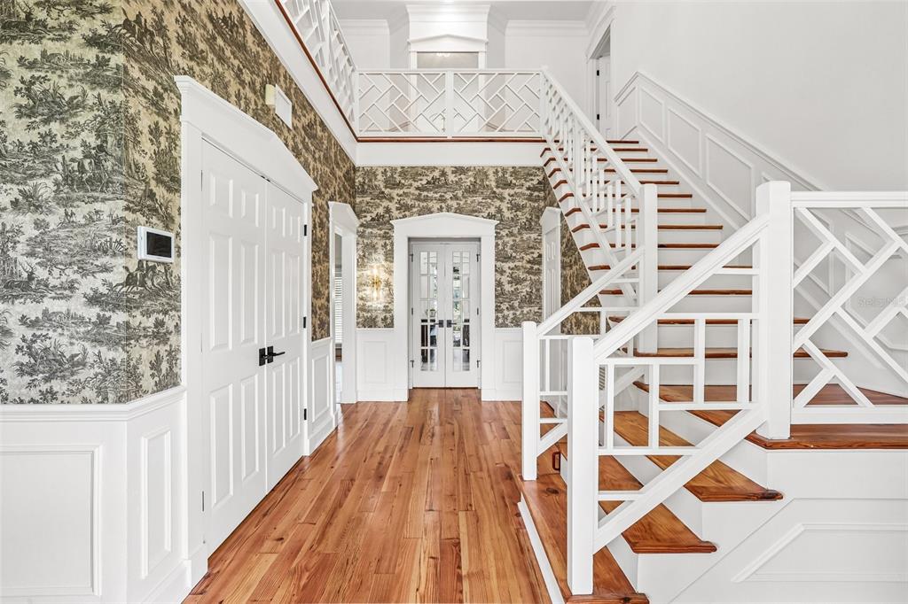 1012 Morfield Lane Brandon, FL 33511 - Photo 13 of 100 a view of a hallway with wooden floor and staircase