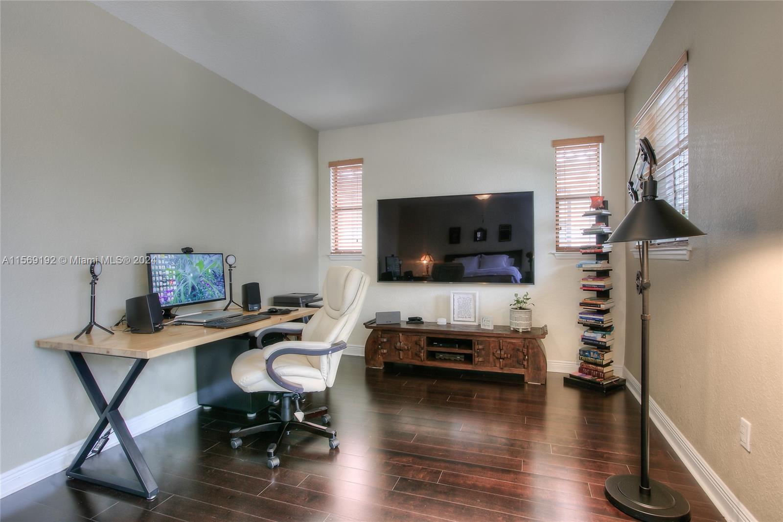 3053 Indiana Street, Unit 12 Miami, FL 33133 - Photo 17 of 23 a living room with furniture and a flat screen tv
